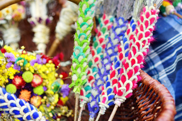 Fototapeta na wymiar Traditional Lithuanian Easter palms known as verbos sold on Easter market in Vilnius