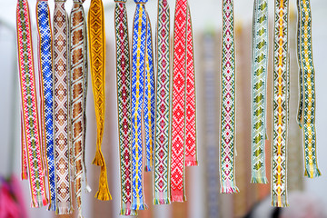 Details of a traditional colorful Lithuanian weave. Woven belts as a part of national Lithuanian...