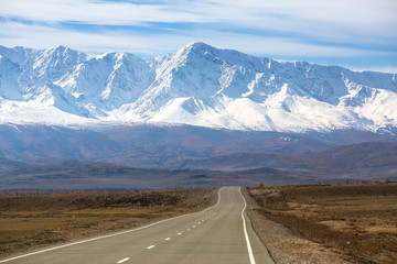 Chuya highway and snowy peaks Chuya ridge at Altai mountains, Russia.