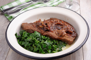 Beef steak with spinach