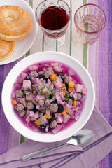 Purple carrot soup with meatballs