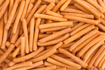 pile of Bread stick or Biscuit stick.