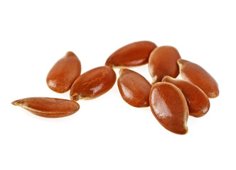 Obraz premium Close up of flax seeds isolated on white background