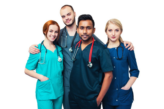 Team Of Young Mixed Race Doctors Isolated Working In A Hospital. Whitebackground