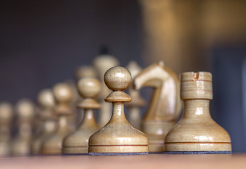 Close up view of white chess pieces