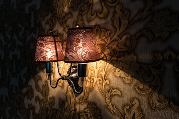 wall sconce lamp included in the room