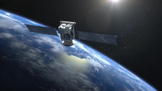 The satellite scan and monitor the Earth. The satellite is orbiting the Earth. The camera shoots the satellite close-up. The Earth's horizon is turned to the right. 4K.