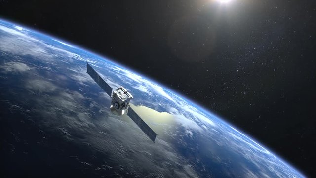 The satellite scan and monitor the Earth. The satellite slowly flies away. The satellite is orbiting the Earth. The Earth's horizon is turned to the right. 4K.