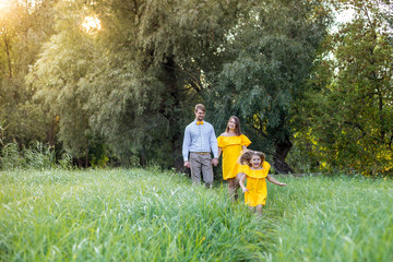 family walk in the summer