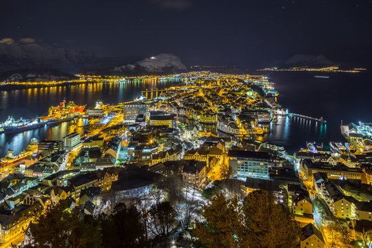 Panoramic view of the town of Ålesund by night from Aksla hill.