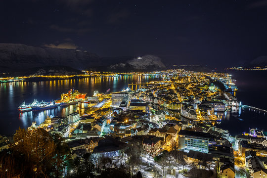 Panoramic view of the town of Ålesund by night from Aksla hill.