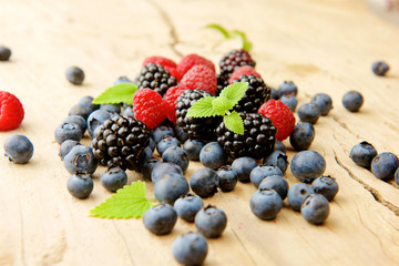 forest berries on a wooden background