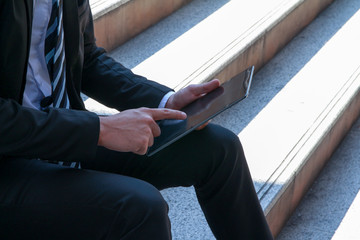 businessman click laptop outside