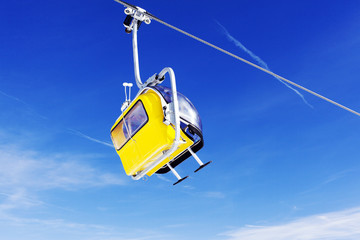 A view of ski lift and cabin and cables in the alps Switzerland