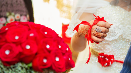 They puted their hands henna of the bride . Drawing henna at the Wedding Henna party. Tattoo . The...