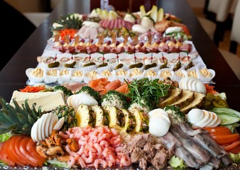 Trays with various delicious snacks