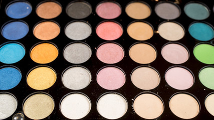 Palette of colorful eye shadow makeup