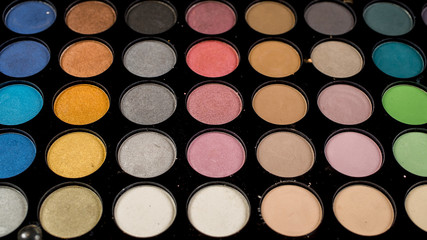 Palette of colorful eye shadow makeup