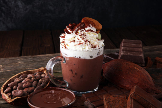 Hot chocolate or coffee with whipped cream in glass
