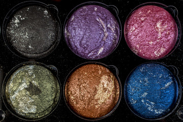 Obraz na płótnie Canvas Palette of colorful eye shadow makeup