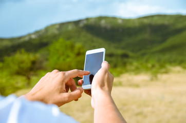 Male holding smart phone