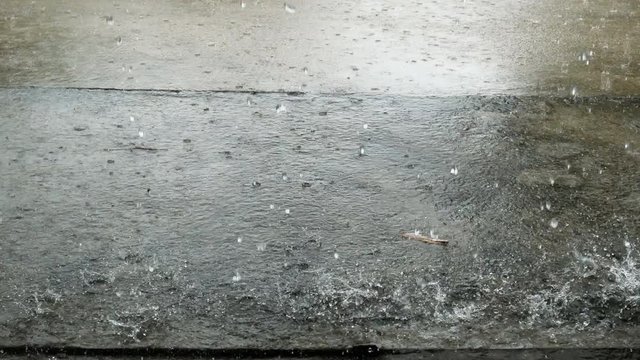 Closeup shot of heavy rain on road 