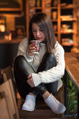 Young woman in a coffee shop