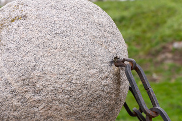 Stone ball with chains