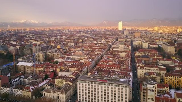 turin aerial shot at sunrise pan over city wide shot