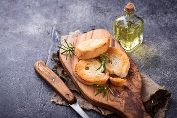 Toasted bread with olive oil and rosemary