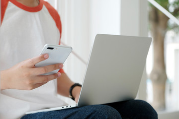 Man using laptop computer and smart phone, people and technology, lifestyles