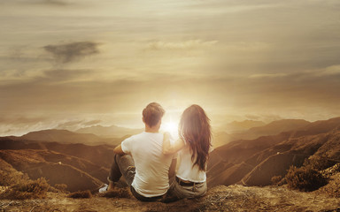 Relaxed couple watching a sunset