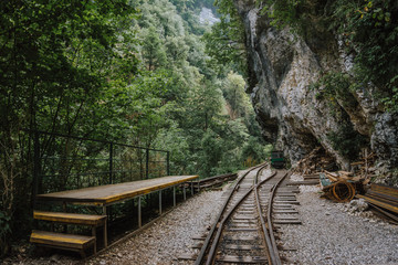 Fototapeta premium Old railroad or railway road in mountain landscape