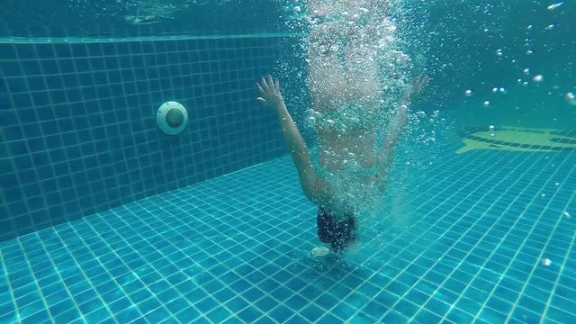 Girl swimming in the pool