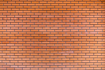 Obraz premium brick wall pattern. orange brick wall background