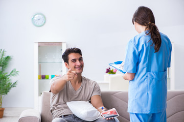 Patient getting blood transfusion in hospital clinic