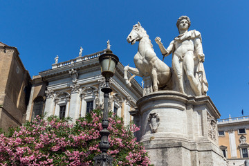 Statue and Flowers in front of Capitoline Museums in city of Rome, Italy