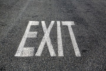 Exit sign on asphalt