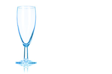 Empty glass of champagne toned in blue color.