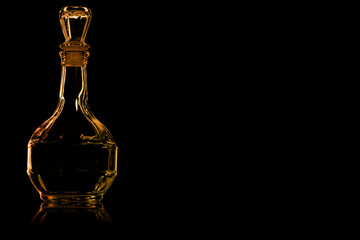 Empty decanter with fire reflection.