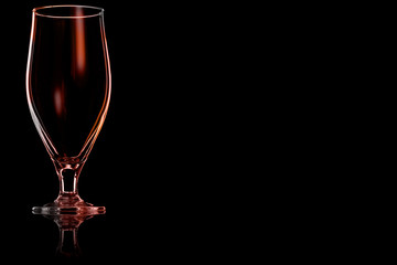 Empty beer glass with fire reflection.