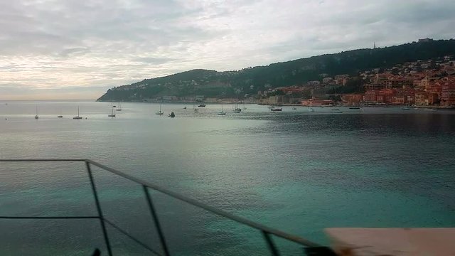 Beautiful View of the Mediterranean Sea And Villefranche-Sur-Mer From a Window of a Moving French Train, French Riviera - 4K Video

