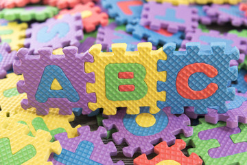 Fototapeta na wymiar letters abc a puzzle alphabet. logic games. teaching aids for children. parts.