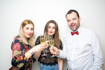 three people funny props pose photo booth happy fun bottle 