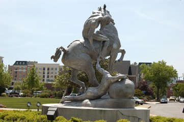 statue of two men, one on a horse