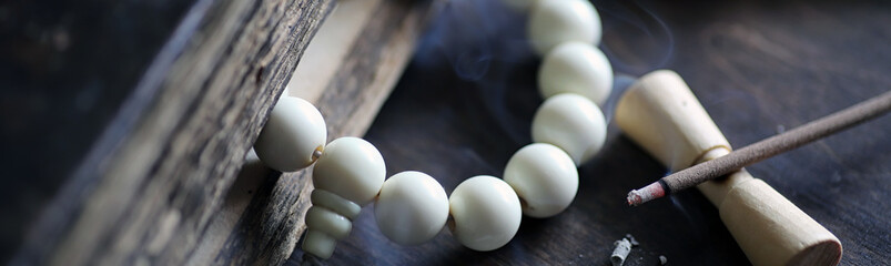 Background long horizontal with beads and Incense