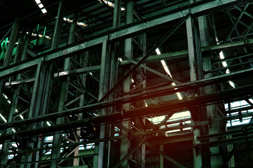 Inside of old abandon factory. A structure interior of empty industry warehouse. An abandon old factory with no equipment and machine. Image of rustic factory room structure made from iron and steel.
