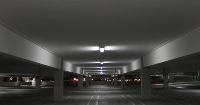Empty parking garage at night