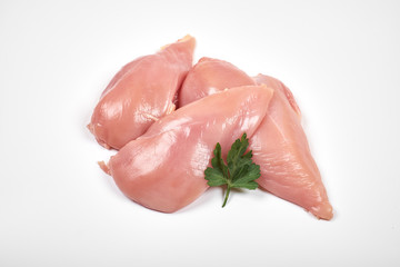 Raw chicken breast fillets isolated on white background