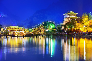 Fototapeta na wymiar Fenghuang Ancient Town at night. Located in Fenghuang County. Southwest of HuNan, China.